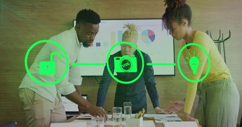 Icons Overlay Diverse Team Collaborating in Office