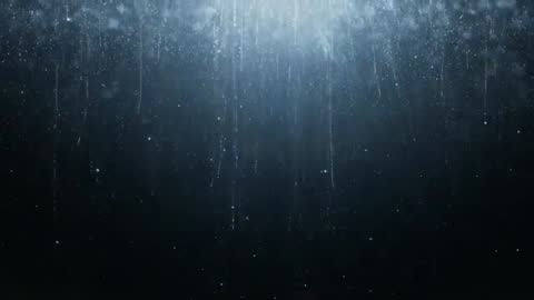 Backlit Rain Curtain Falling at Night with Streaming Droplets and Mist