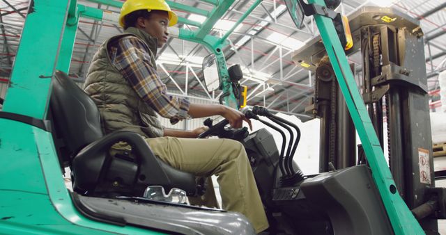 Warehouse Worker Operating Forklift in Industrial Facility - Download Free Stock Images Pikwizard.com