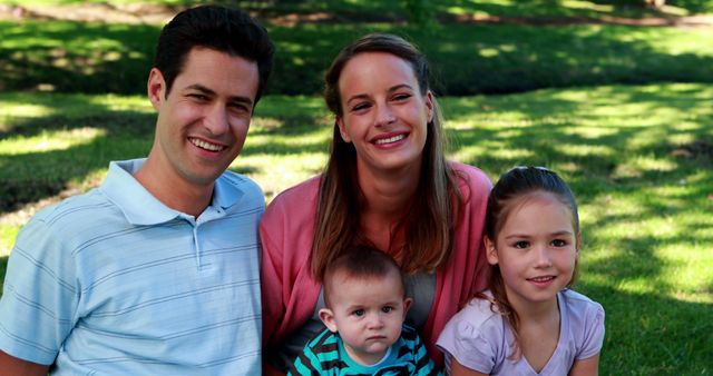 Happy Family Relaxing Outdoors on Sunny Day - Download Free Stock Images Pikwizard.com