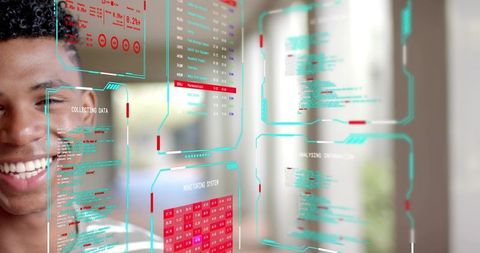 Young man interacting with holographic data panels and digital dashboards in futuristic lab