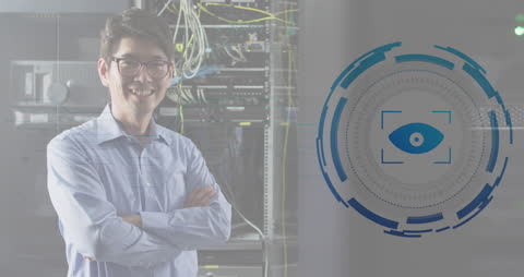 Engineer Standing in Server Room with Futuristic Security Interface