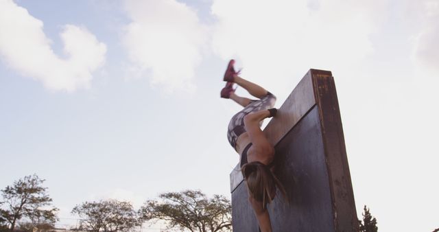 Athletic Woman Overcoming Obstacle in Outdoor Challenge - Download Free Stock Images Pikwizard.com