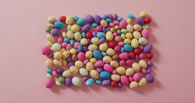 Image of decorated colorful easter eggs on a pink surface - Download Free Stock Photos Pikwizard.com