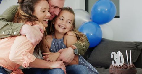 Family Celebrating Birthday with Daughter and Parents
