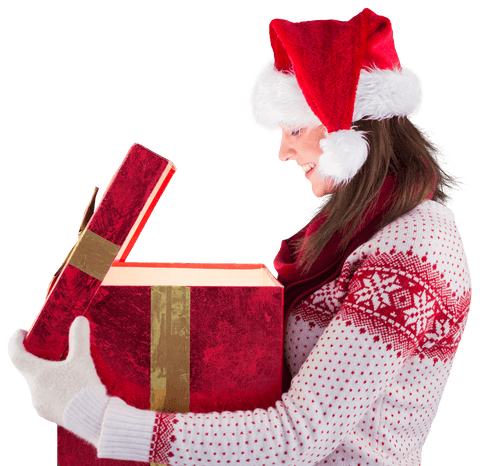 Smiling woman in santa hat opening bright red present