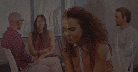 Stressed woman in office environment, workplace pressure concept