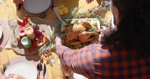 Friends Gathering to Celebrate Seasonal Feast with Roast Turkey - Download Free Stock Images Pikwizard.com