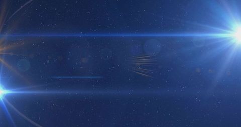 Cinematic deep space starfield with dual blue lens flares and streaking light for sci-fi