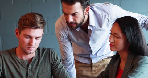 Team Collaborating on Business Project at Modern Office Workspace