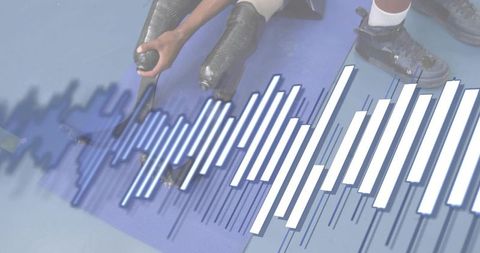 Teen reaching with carbon blade prosthetic during rehab training with waveform overlay