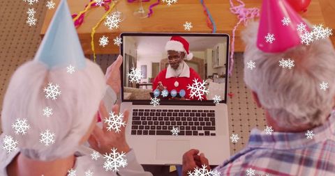 Senior Couple Video Calling Santa During Christmas Celebration