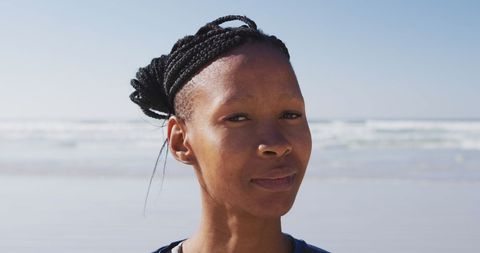 Woman with Braided Hair on Sunny Beach - Download Free Stock Images Pikwizard.com