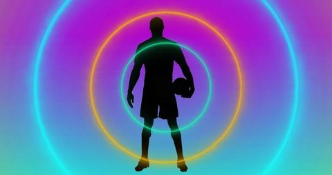 Silhouette of Male Athlete With Neon Concentric Rings