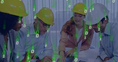 Engineers Collaborating on Digital Construction Plans with Binary Data Overlay and Laptop