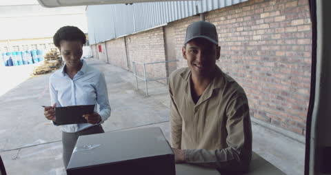 Warehouse Delivery Team Completing Logistics Task Outside