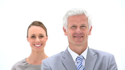 Professional Business Team Smiling in Formal Attire