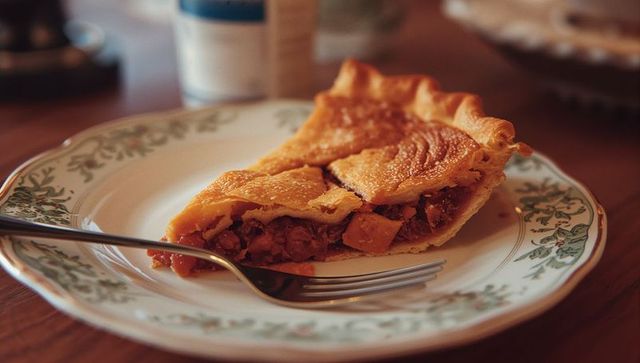 Rustic Vegetable Pie Slice on Elegant Ceramic Plate