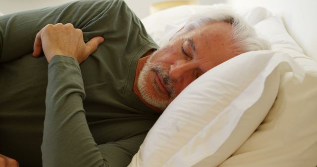 Senior Man Sleeping Peacefully on Comfortable Bed - Download Free Stock Images Pikwizard.com