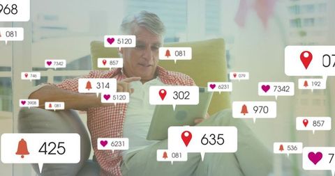 Senior Engaging with Tablet Surrounded by Digital Notifications