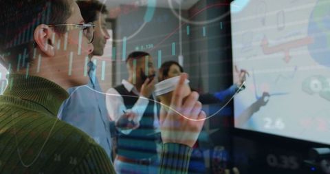 Business Team Analyzing Data with Financial Overlay in Meeting