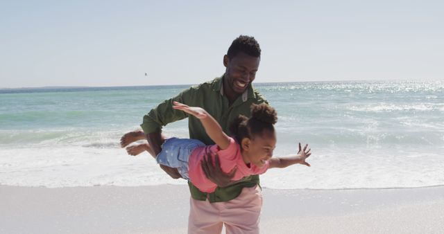 Father and Daughter Enjoying Playful Day at the Beach - Download Free Stock Images Pikwizard.com