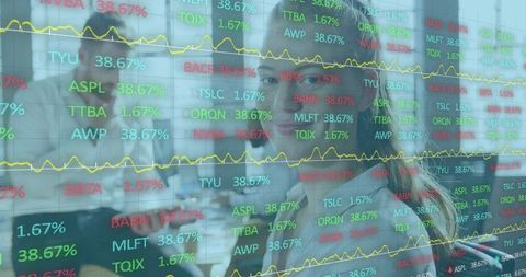 Analysts Evaluating Stock Market Trends Behind Glass