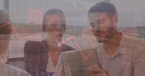 Business Team Analyzing Data Against Nature Backdrop