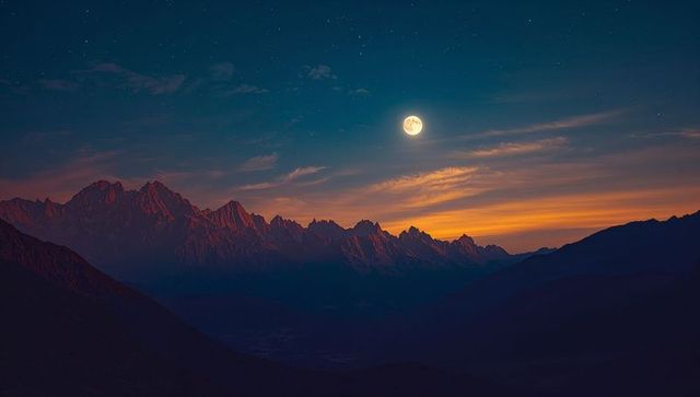 Majestic moonlight illuminating rugged mountain peaks