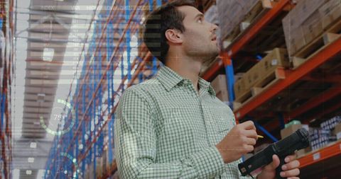 Warehouse Worker Using Technology for Inventory Management