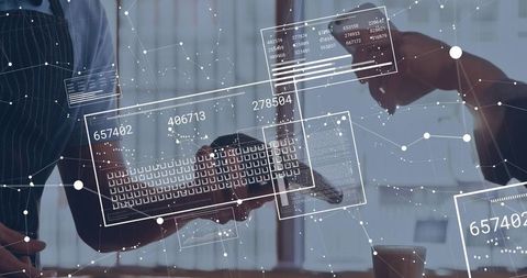 Colleagues collaborating with smartphone and tablet displaying holographic data dashboard