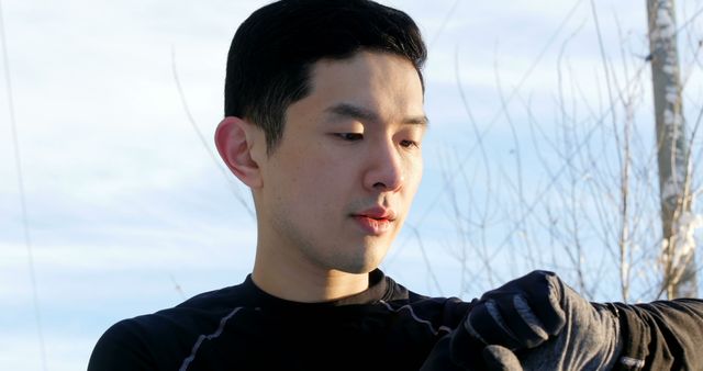 Young athletic man checking wristwatch during outdoor workout - Download Free Stock Images Pikwizard.com