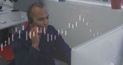 Business Analyst Reviewing Financial Data on Computer Screen