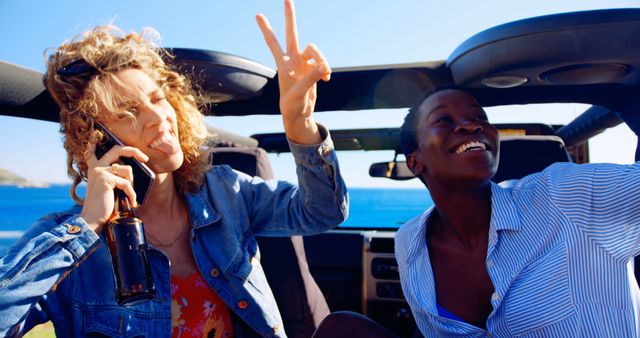 Friends Enjoying Road Trip in Convertible Car by Beach - Download Free Stock Images Pikwizard.com