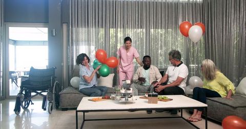 Patients Welcoming New Physiotherapy Patient in Treatment Centre