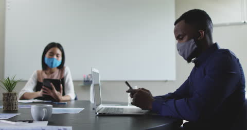 Diverse Colleagues Working Safely During Pandemic