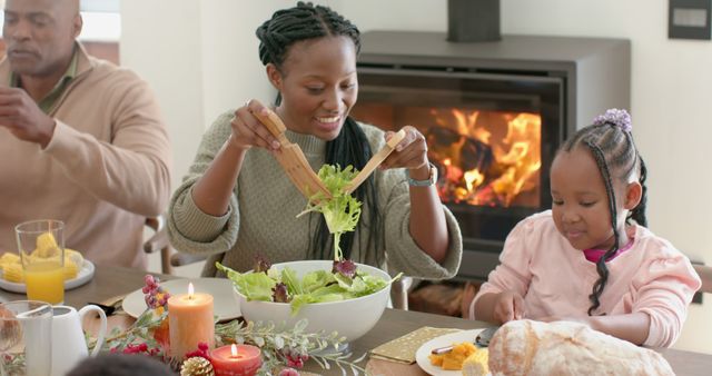African American Family Enjoying Meal in Cozy Home by Fireplace - Download Free Stock Images Pikwizard.com