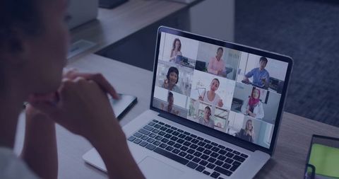 Virtual Meeting with Diverse Team on Laptop from Office