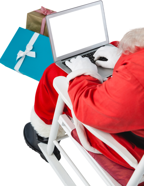 High Angle of Transparent Santa Claus Using Laptop with Gifts Nearby - Download Free Stock Videos Pikwizard.com