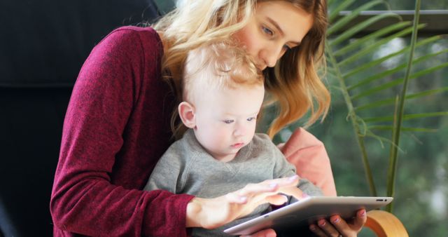 Mother and Toddler Bonding with Tablet Technology Indoors Close-up - Download Free Stock Images Pikwizard.com