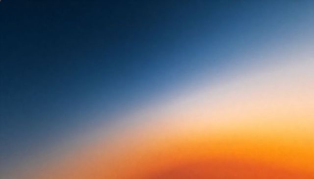 Diagonal Sunrise Gradient Blending Deep Navy Blue into Warm Amber Glow Minimal Abstract