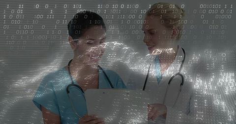 Healthcare Professionals Analyzing Digital Records in Medical Clinic