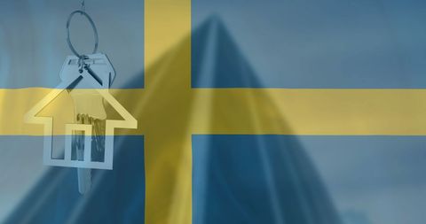 Keys symbolize real estate market on sweden flag background