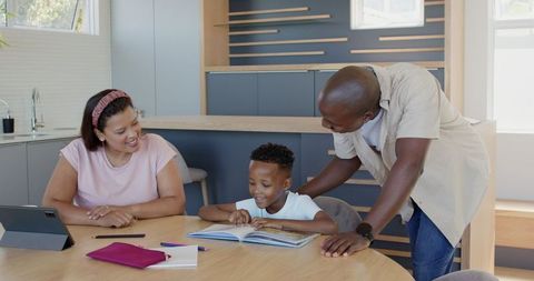 Diverse Family Enjoying Quality Reading Time Together at Home
