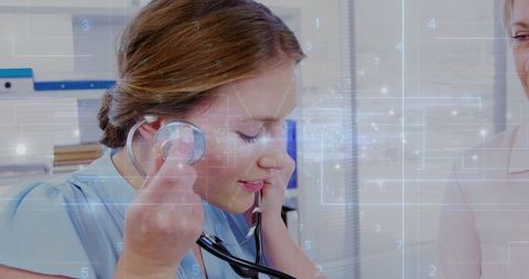 Healthcare Professional Using Stethoscope with Technology Interface