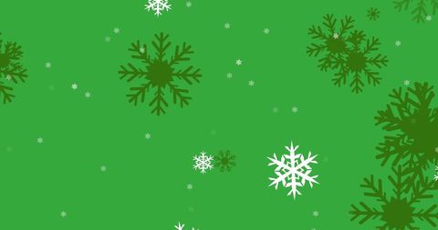 Snowflakes Falling on Green Background for Christmas Celebration