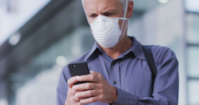 Senior Man Wearing Medical Mask Using Smartphone Outside - Download Free Stock Images Pikwizard.com