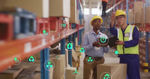 Warehouse Workers Analyzing Eco-Friendly Logistics and Technology - Download Free Stock Images Pikwizard.com