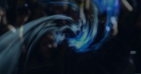 Abstract Glowing Blue Vortex in Dark Space