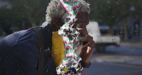 Urban Interaction: Man Communicating Amidst Digital Abstraction